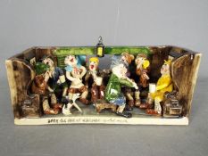 Runnaford Pottery - A Will Young 'Widecombe Fair' figural group 'After The Fair At Widecombe In The