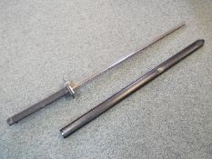 A replica Katana sword with black handle wrap and black scabbard. Blade length approx.