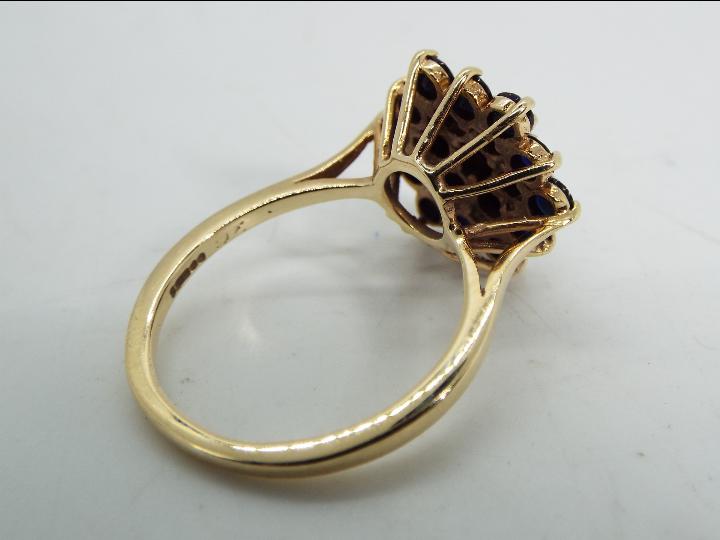 9ct gold - a 9 ct gold sapphire cluster ring, cluster measures 2 cm (d), size O½, approx weight 4. - Image 4 of 5