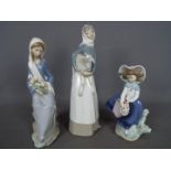 Lladro - Three Lladro figurines comprising # 5222 'Pretty Pickings',
