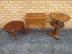 A small side table, an occasional table and similar, largest approximately 73 cm x 53 cm.