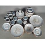 A collection of Denby dinner and tea wares in the 'Reflections' pattern, in excess of 60 pieces.