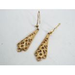 9 ct gold - a pair of 9ct gold earrings,