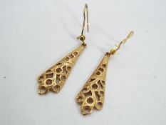 9 ct gold - a pair of 9ct gold earrings,