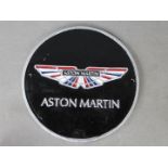A cast Aston Martin sign,