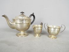 A George V hallmarked silver tea set, Sheffield assay 1934, sponsors mark for Viner's Ltd,