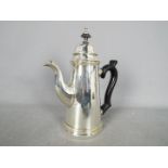A good quality silver plated coffee pot, approximately 21 cm (h).