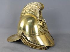 A fireman's brass helmet (reproduction).