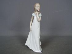 Lladro - A Lladro 2006 Events Creation figurine 'A Special Occasion', approximately 22.5 cm (h).