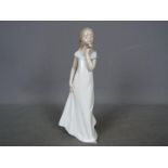 Lladro - A Lladro 2006 Events Creation figurine 'A Special Occasion', approximately 22.5 cm (h).