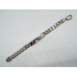 A silver I.D bracelet, approx length 19 cm (l) approx weight 29.