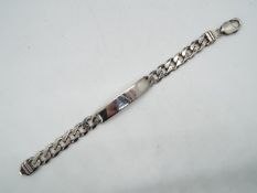 A silver I.D bracelet, approx length 19 cm (l) approx weight 29.