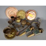 A quantity of metalware, brass and copper.