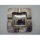 A square silver ashtray, Birmingham hallmark 1935,