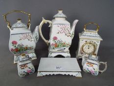 Franklin Mint 'Birds an Flowers of the Orient' tea wares comprising teapot and stand,