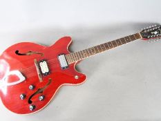 A Guild Starfire XII semi hollow, 12 string electric guitar, made in the USA, serial number DC-XX6,