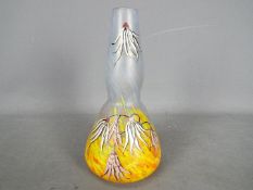 An art glass vase with floral decoration, signed 'Legras',