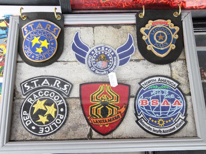 A collection of framed patches relating to martial arts, Resident Evil games and similar. - Image 2 of 5