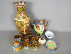 A collection of Oriental ceramics to include a 'Genuine Samurai China' hand painted tea set,
