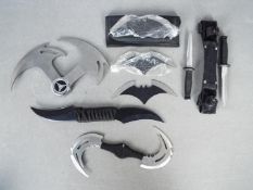 A collection of unusual bladed items to include 3 "Baterangs" two double-bladed knives (one