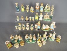 A collection of Golden Rose Giftware ceramic figurines of mice and bears.