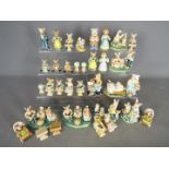 A collection of Golden Rose Giftware ceramic figurines of mice and bears.