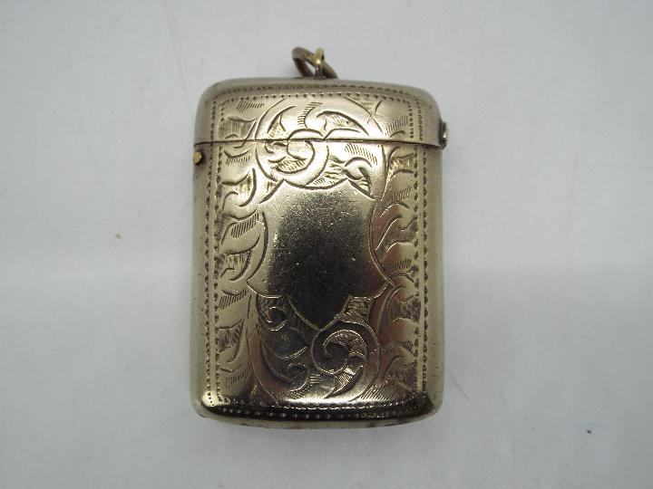 A silver plated Vesta case,