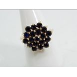 9ct gold - a 9 ct gold sapphire cluster ring, cluster measures 2 cm (d), size O½, approx weight 4.