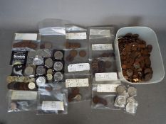 A collection of UK and foreign coins, commemorative crowns, Victorian and later.