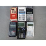 A small collection of vintage calculators to include Casio, Texas Instruments and Sharp.