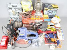 A mixed lot of tools to include a Black & Decker Power File, a planer stand, glue gun,