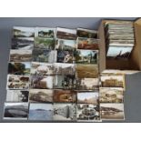 In excess of 500 mainly early period UK topographical postcards to include street scenes and a few