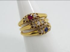 18ct gold - a 18 ct gold stone set triple ring, size L½, approx weight 5.