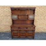 A kitchen dresser measuring approximately 175 cm x 135 cm x 44 cm.