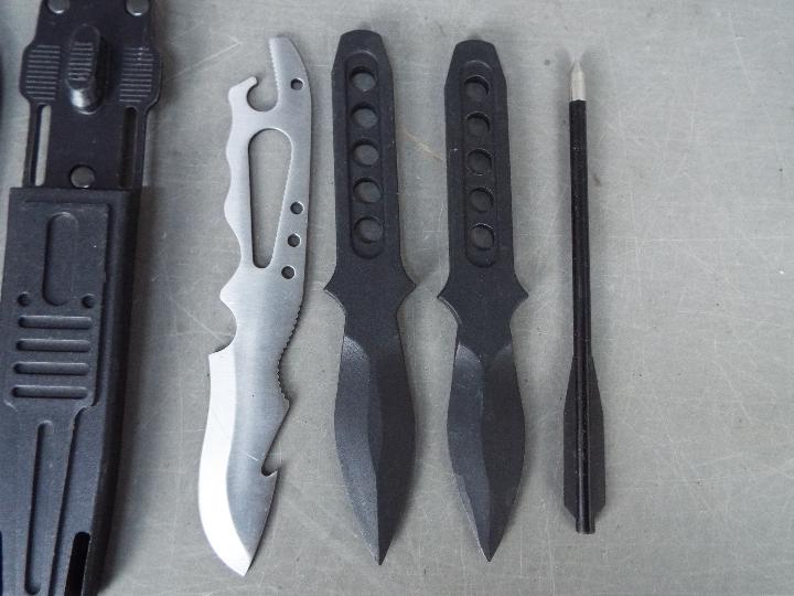 A pair of survival boot knives one black and one stainless steel, - Image 2 of 3