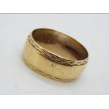 A 9ct gold wedding band, size T, approximately 5.5 grams all in.