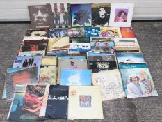 A collection of 12" vinyl records to include The Who, Blondie, Lou Reed, U2, Kate Bush,