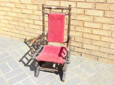 A childs American rocking chair.