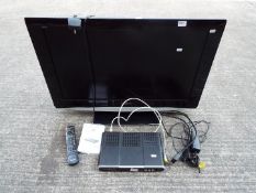 A Panasonic Viera 32" television model TX-32LXD85 and a Freeview receiver.