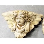 Garden Stoneware - a reconstituted wall pocket in the form of a cherub
