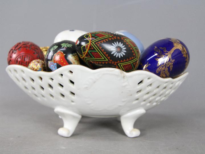 A bowl containing a collection of egg ornaments to include stone, glass, champlevé, - Image 2 of 3