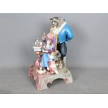 A large Disney 'Beauty And The Beast' snow globe,