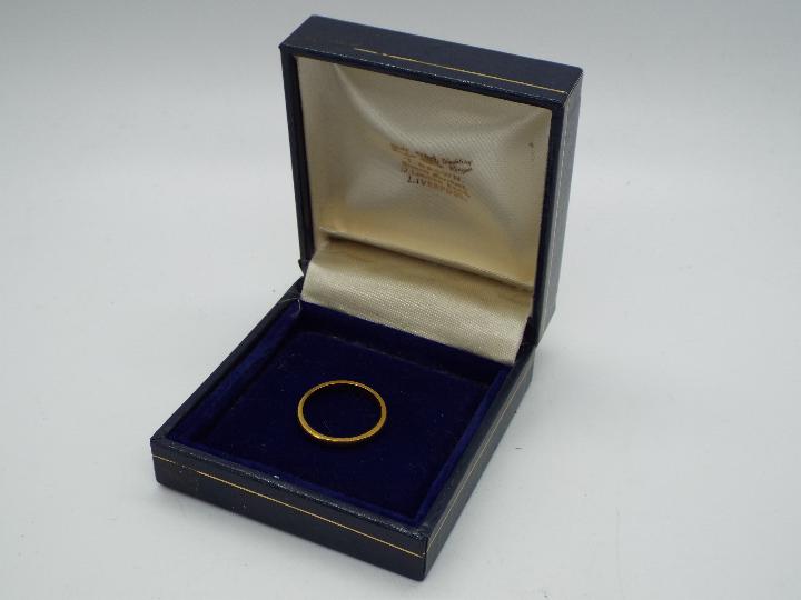 A 22ct gold wedding band, size N½, approximately 3.3 grams all in. - Image 3 of 3