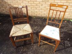 A chair with inlaid decoration and rush