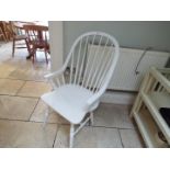 Two white painted stick back chairs (onl