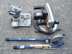 A circular cross cut saw, an angle grinder support and other.