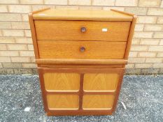 A Parker Knoll side cupboard, approximately 75 cm x 52 cm x 45 cm.