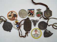 Sporting Badges. A collection that contains Nine German Skiing Medals / Badges circa 1950s.