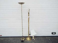 Two standard lamps, largest approximately 180 cm (h) and an onyx table lamp.