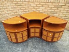 A Parker Knoll sectional corner unit in teak, largest piece approximately 75 cm x 70 cm x 70 cm.